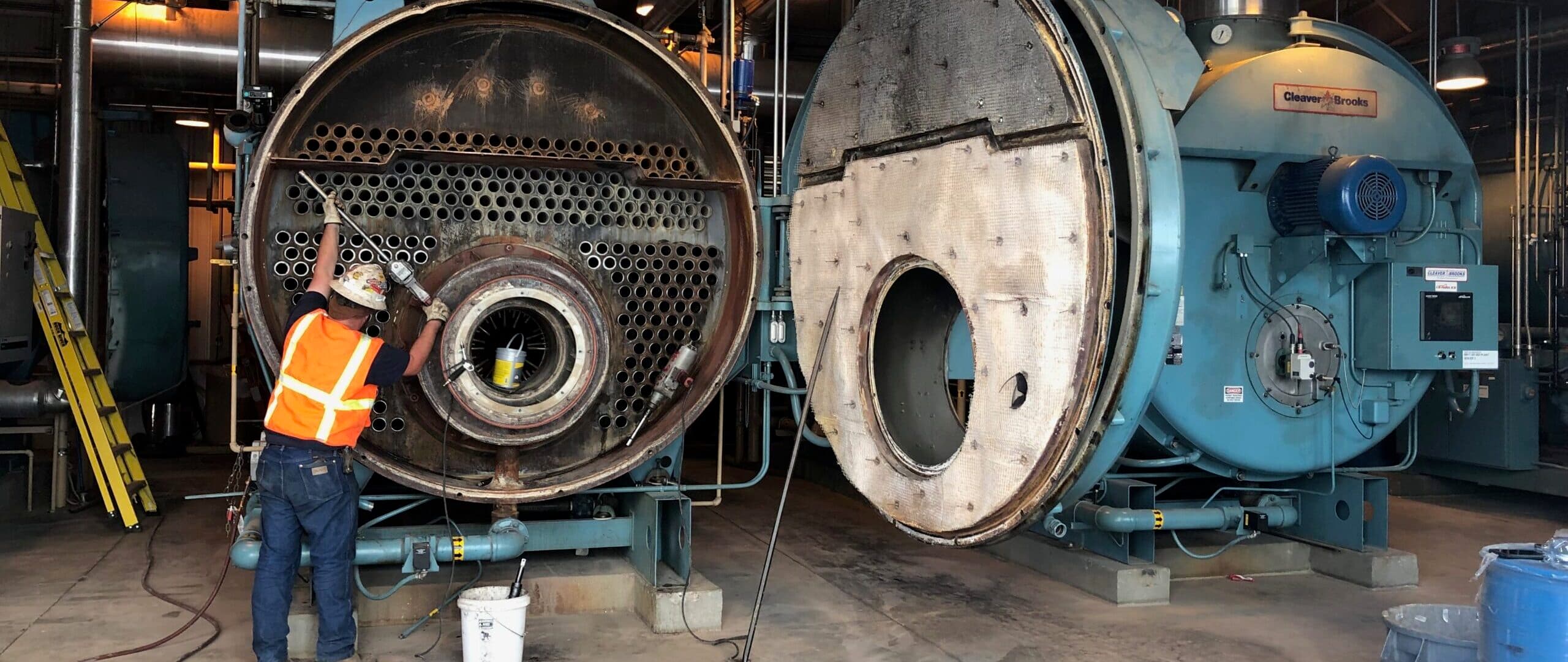 Servco technicians installing a commercial boiler